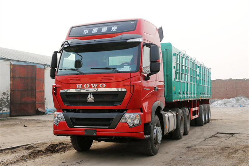 中国重汽 HOWO T7H重卡 440马力 6X4 国四牵引车(MCY11双后桥)(高顶)(ZZ4257V324HD1B)